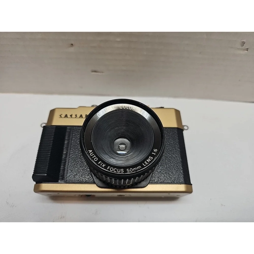 VINTAGE CAESARS ATLANTIC CITY SOUVENIR 35MM FILM CAMERA  GOLD CASE